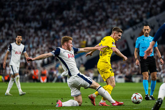Dejan Kulusevski of Tottenham and Fredrik Sjøvold of