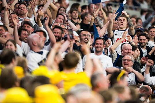 Spectators in the stands celebrates