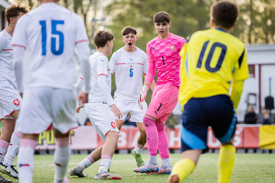 Jakub Chvilicek and goalkeeper Jakub Vesely of Czech