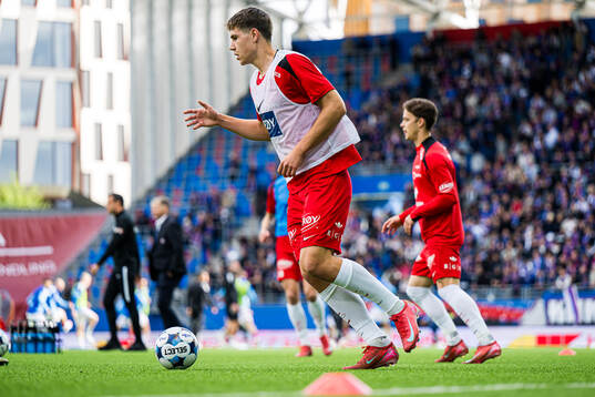 Eivind Helland of Brann warms up