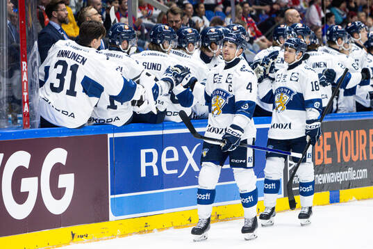 Mikko Lehtonen and Vili Saarijärvi of Finland celebrate