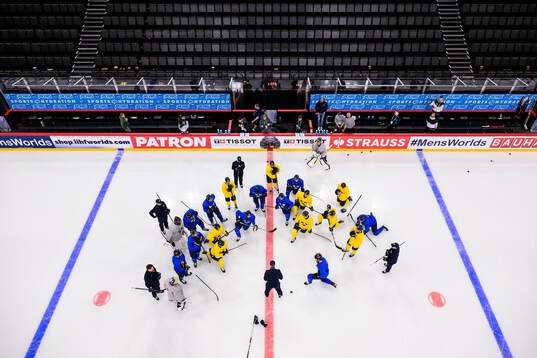 Head coach Sam Hallam of Sweden talking to players at a
