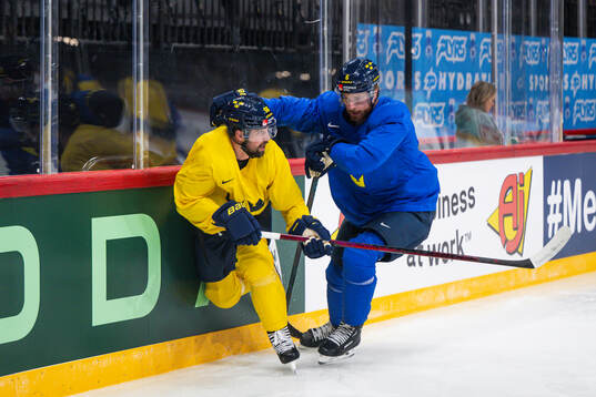 Erik Gustafsson and Adam Larsson of Sweden at a practice