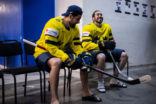 Erik Gustafsson and Mika Zibanejad of Sweden awaits the