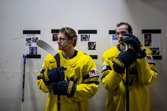 Jonas Brodin and Marcus Pettersson of Sweden awaits the