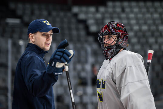 Goaltender coach Anthon Hansson and goaltender Jacob