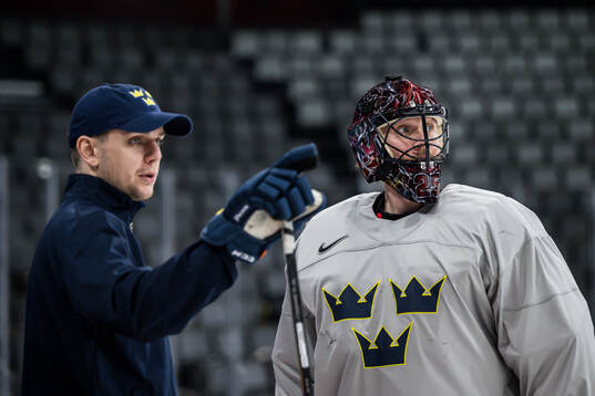 Goaltender coach Anthon Hansson and goaltender Jacob