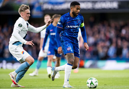 Viktor Bergh of Djurgården and Trevoh Chalobah of Chelsea