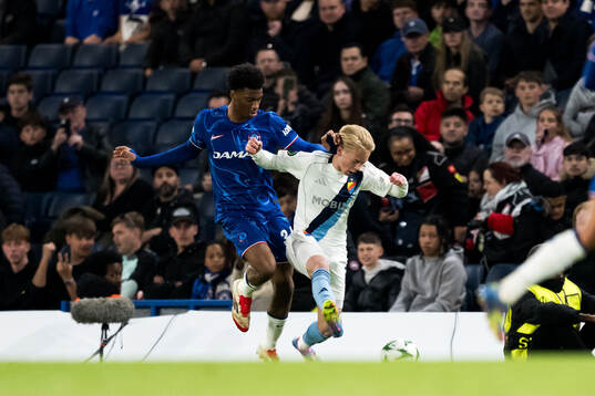 Joshua Acheampong of Chelsea and Carl Selfvén of