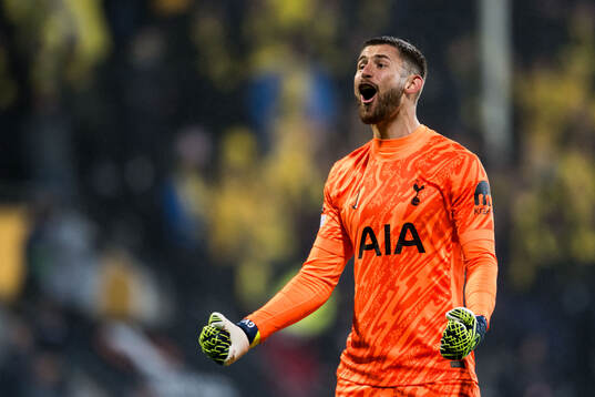 Goalkeeper Guglielmo Vicario of Tottenham Hotspur celebrates
