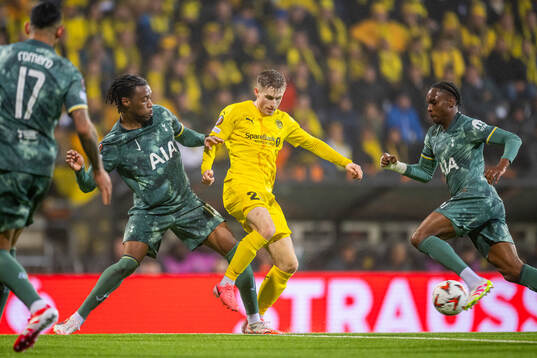 Destiny Udogie of Tottenham Hotspur and Fredrik Sjøvold of