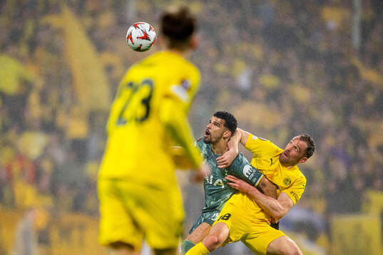 Dominic Solanke of Tottenham Hotspur and Brede Moe of