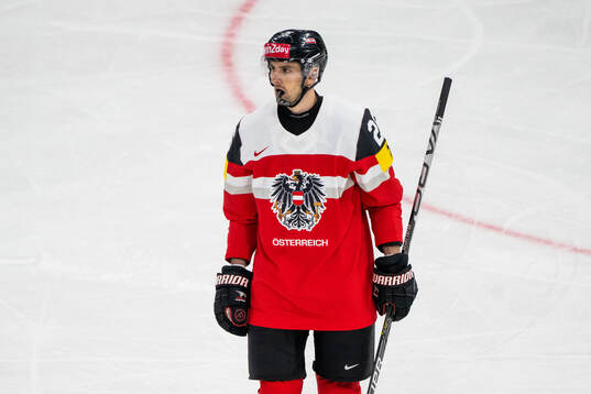 Oliver Achermann of Austria looks dejected