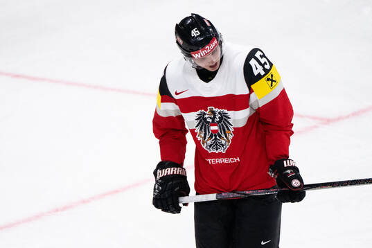 Gregor Biber of Austria looks dejected