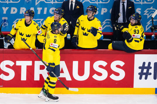 Jonas Brodin of Sweden celebrates with Lucas Raymond, Leo