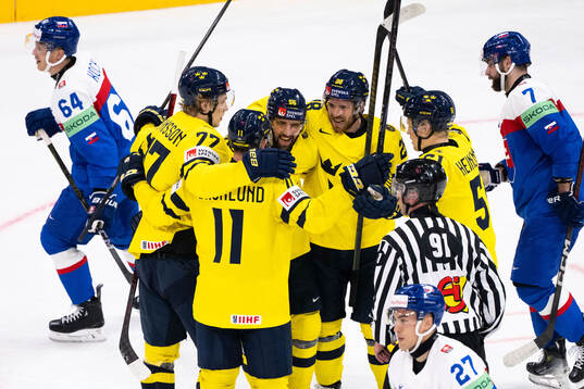 Elias Lindholm of Sweden celebrates with Erik Gustafsson