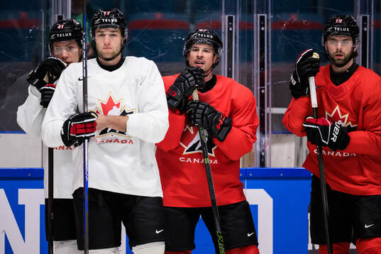 Ryker Evans, Will Cuylle, Sidney Crosby and Adam Fantilli