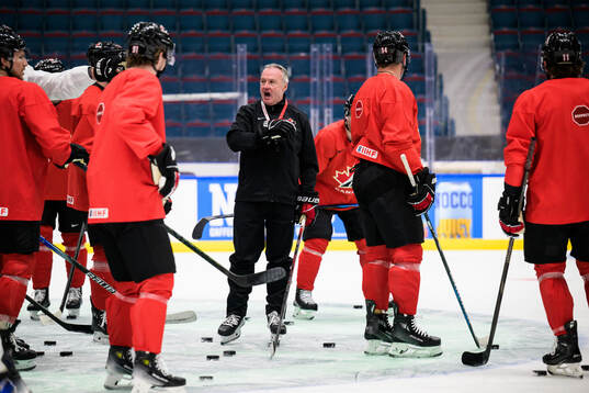 Head coach Dean Evason of Canada at a practice session