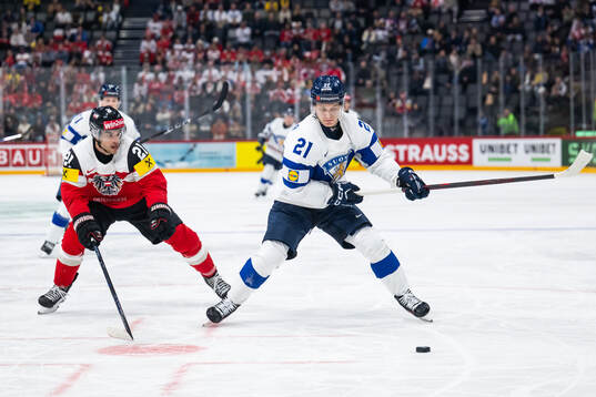 Lukas Haudum of Austria and Patrik Puistola of Finland