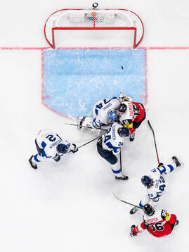 Marco Kasper of Austria scores a goal for 2-2 behind Rasmus