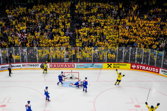 Emil Heineman, Mikael Backlund and Rasmus Andersson of