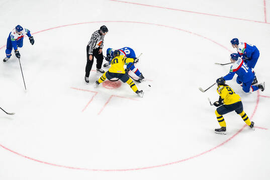 A face off between Alexander Wennberg of Sweden and Matus