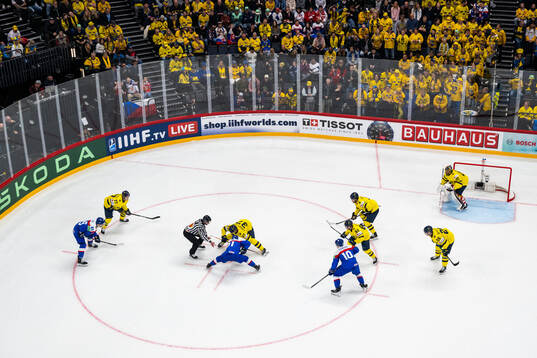 Face off between Matus Sukel and Isac Lundeström of Sweden