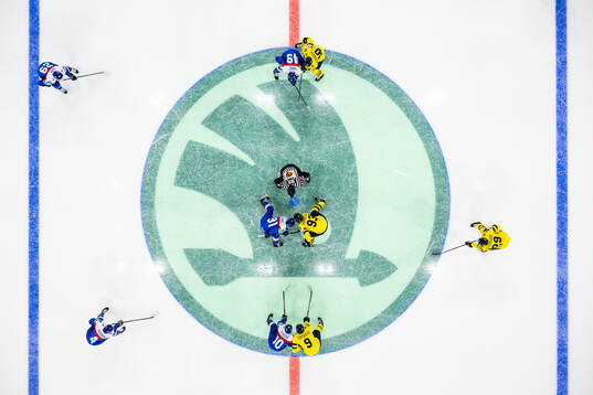 Face off between Matus Sukel of Slovakia and Mika Zibanejad