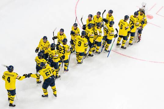 Players of Sweden celebrate