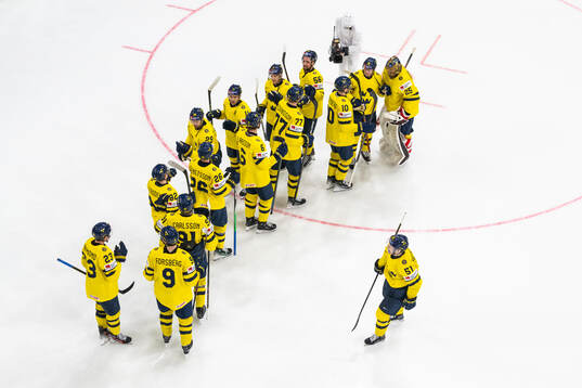 Players of Sweden celebrate