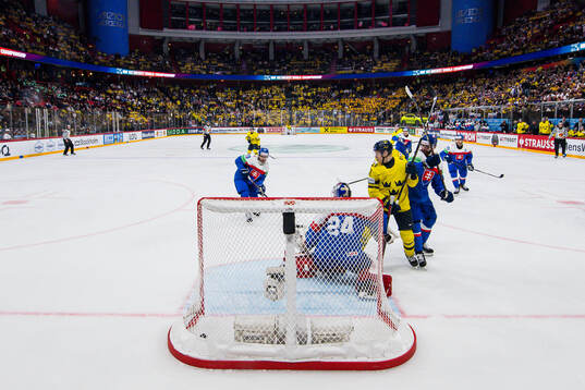 Emil Heineman of Sweden sees goaltender Patrik Rybar of