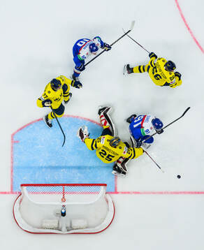 Adam Sykora and Matus Sukel of Slovakia challenge Simon