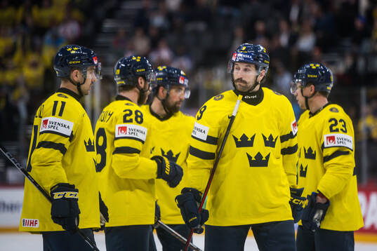 Mikael Backlund, Elias Lindholm, Filip Forsberg and Lucas