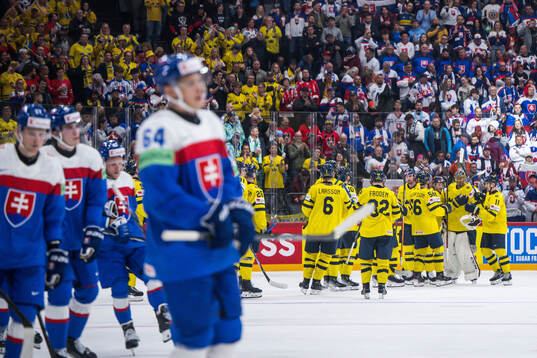 Jacob Markström of Sweden celebrates with team mates