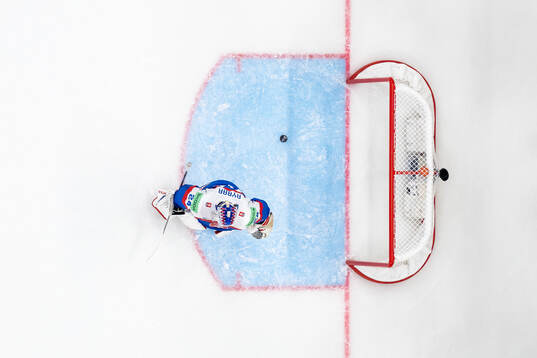 Goaltender Patrik Rybar of Slovakia looks dejected