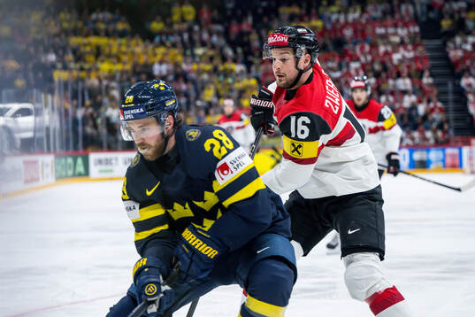 Elias Lindholm of Sweden and Dominic Zwerger of Austria