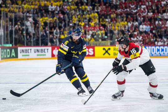 Adam Larsson of Sweden and Dominic Zwerger of Austria