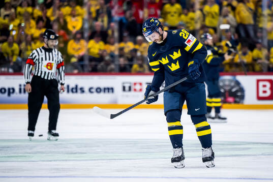 Elias Lindholm of Sweden looks dejected