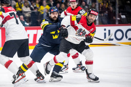 Filip Forsberg of Sweden and Dominique Heinrich of Austria