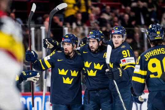 Mika Zibanejad, Erik Gustafsson, and Leo Carlsson of Sweden