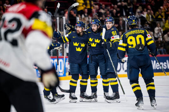 Mika Zibanejad, Erik Gustafsson, and Leo Carlsson of Sweden