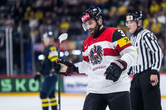 Peter Schneider of Austria looks dejected