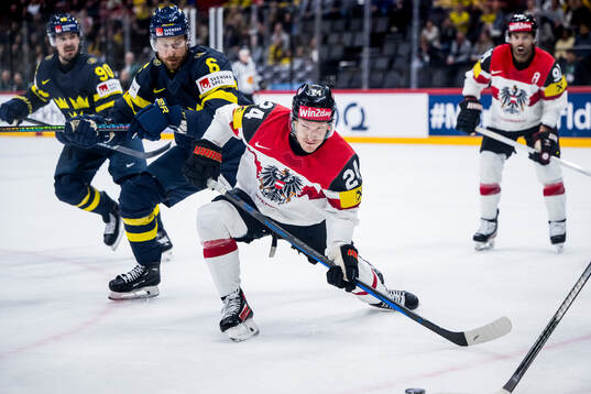 Adam Larsson of Sweden and Benjamin Baumgartner of Austria