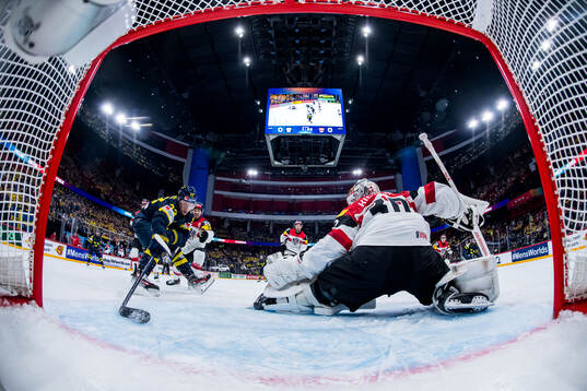 Lucas Raymond of Sweden against Bernd Wolf and goaltender