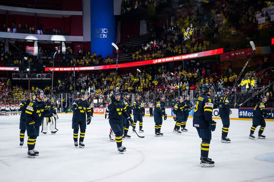 Players of Sweden celebrate