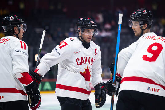 Sidney Crosby of Canada celebrate the 1-0 goal by Bo Horvat