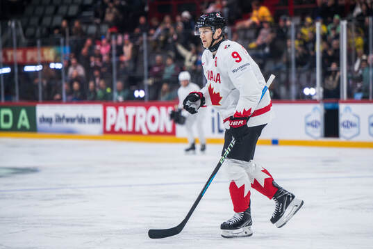 Nathan MacKinnon of Canada celebrates