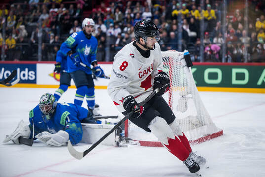 Noah Dobson of Canada celebrates