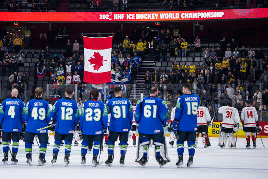 The Canadian flag is raised