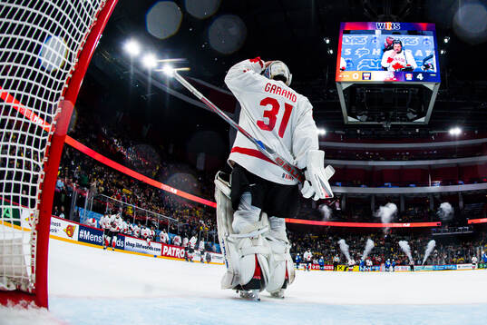 Goaltender Dylan Garand of Canada celebrates